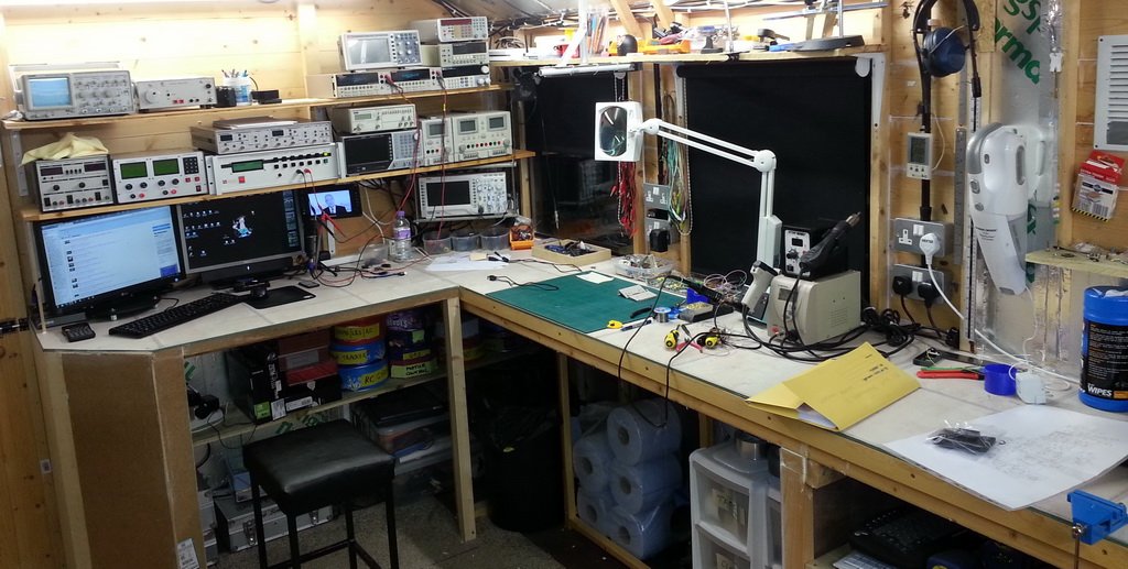 electrical engineer's electronics lab work bench with oscilloscope